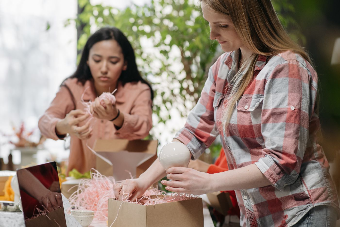 Small business owners preparing ecommerce orders