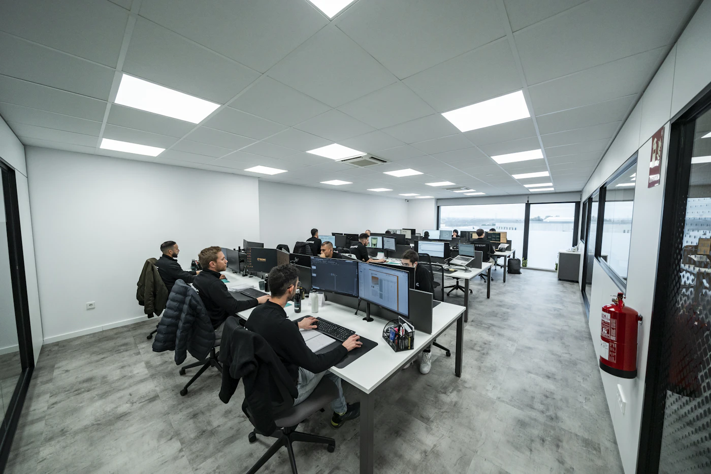 A team working with business software in a modern office